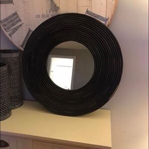 Black framed rustic wall mirror